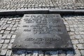 The message on the memorial to those who died in the Nazi concentration camp of Auschwitz Birkenau Royalty Free Stock Photo